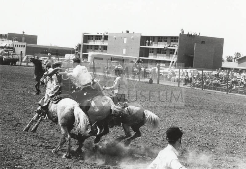 Saddle Bronc Rider Times Out at the Rodeo