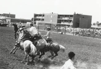 Saddle Bronc Rider Times Out at the Rodeo