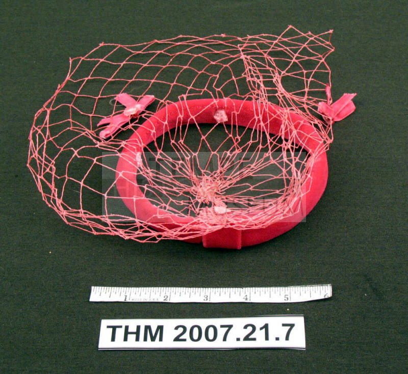 Pink hat with veil.