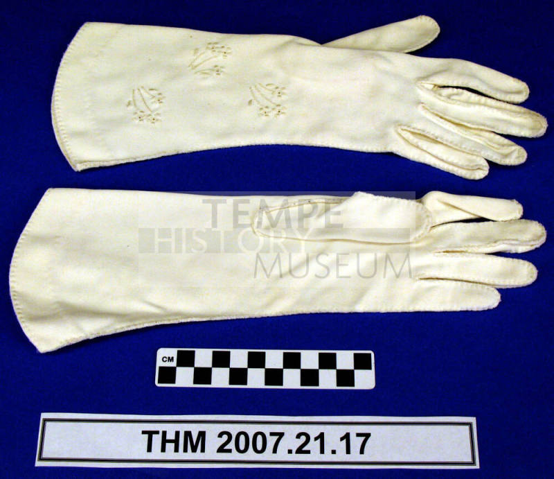 Embroidered evening gloves.