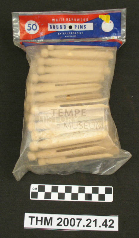 Large, round wooden clothespins in bag (50).