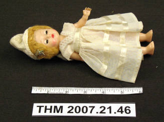 Small plastic doll.