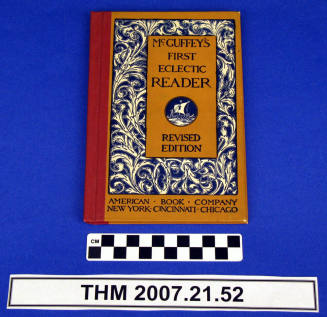 Schoolbook: McGuffey's First Eclectic Reader, Revised Edition.