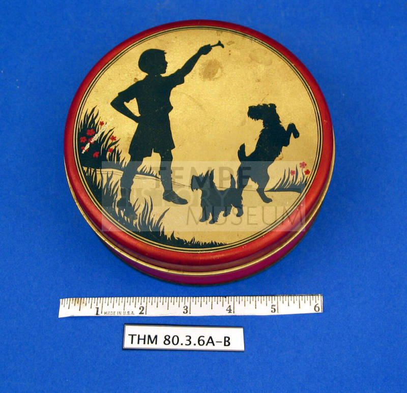 Decorated tin container