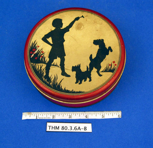 Decorated tin container