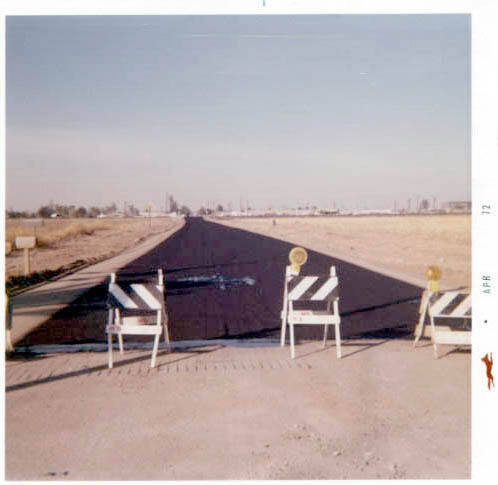 Photograph: Oiling Price Road North of Broadway, by Luis Chacon