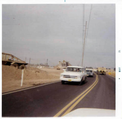 Photograph: Paved Road and Construction Site, by Luis Chacon