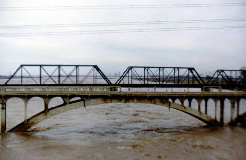 Photographic Slide - Flood Waters Under Ash Avenue and Railroad Bridges