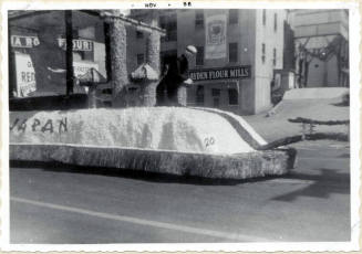 Parade float on Mill Avenue, "Japan" theme, Arizona State College Homecoming 1956
