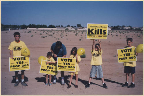 Rocha Family Holding Proposition 200 Signs.