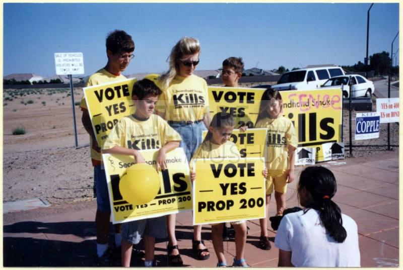 Laura Rocha and her Children with Prop 200 Signs.