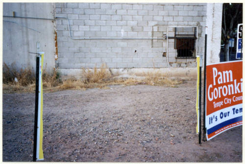 Poles Left Behind After a Propostion 200 Sign Was Cut Down.