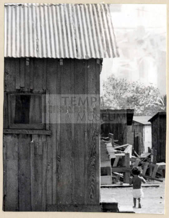 Barrio Building and Child, East of Rural Rd and North of University Dr.