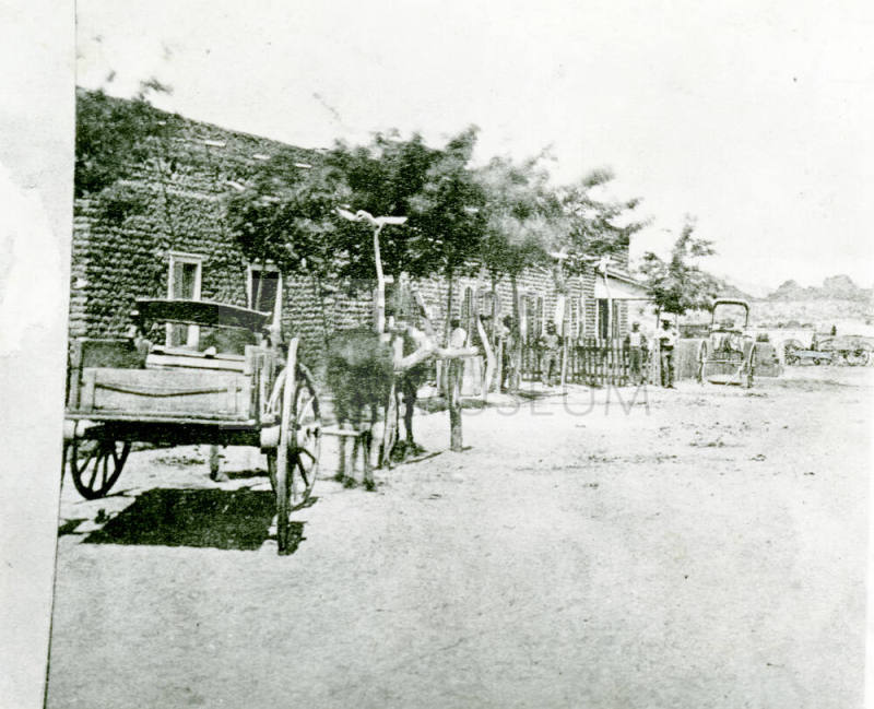 OS-7   Wagons in Front of Hayden House