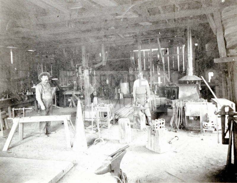 OS-180   Interior Spain's Blacksmith Shop-6th St