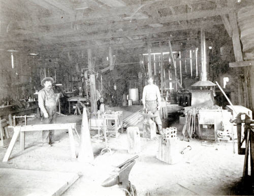 OS-180   Interior Spain's Blacksmith Shop-6th St