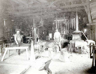 OS-180   Interior Spain's Blacksmith Shop-6th St
