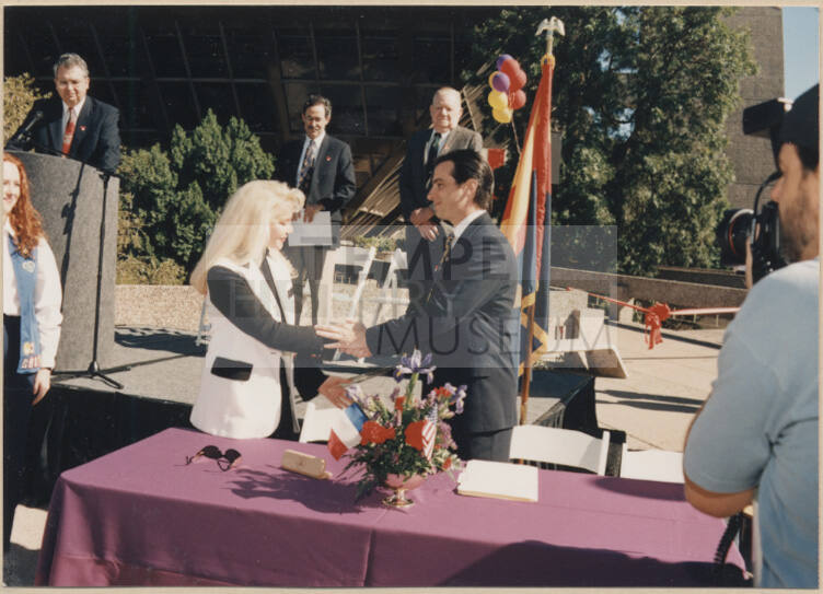 Mayor Neil Giuliano Shakes Citizen's Hand at Tempe's 125th Anniversary Event Presentation at City Hall.