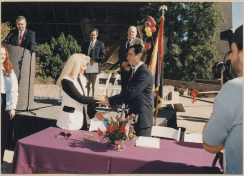 Mayor Neil Giuliano Shakes Citizen's Hand at Tempe's 125th Anniversary Event Presentation at City Hall.