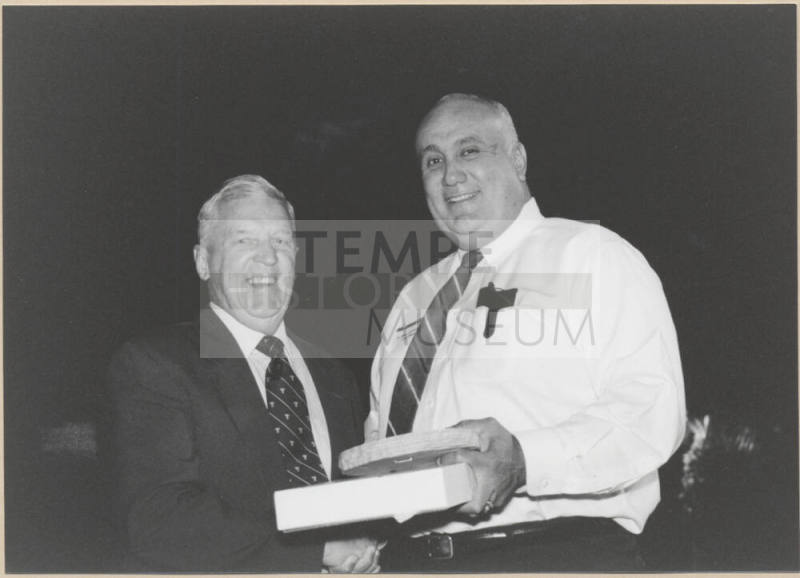 Photo of Vice Mayor Ben Arredondo Presenting Plaque to Outgoing Commission Member, 1999.