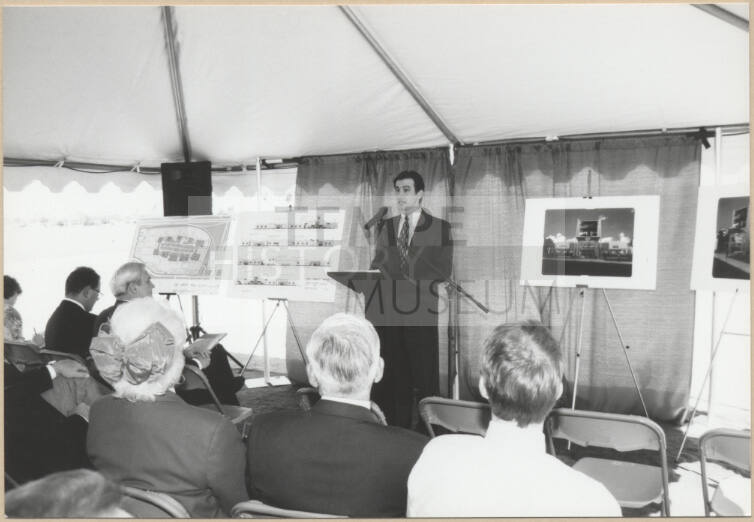 Neil Giuliano Speaks Next to Layout and Elevations for Arizona Mills Mall.