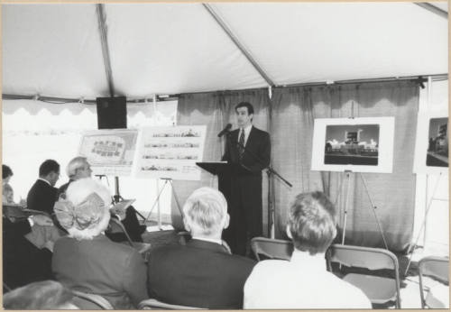 Neil Giuliano Speaks Next to Layout and Elevations for Arizona Mills Mall.