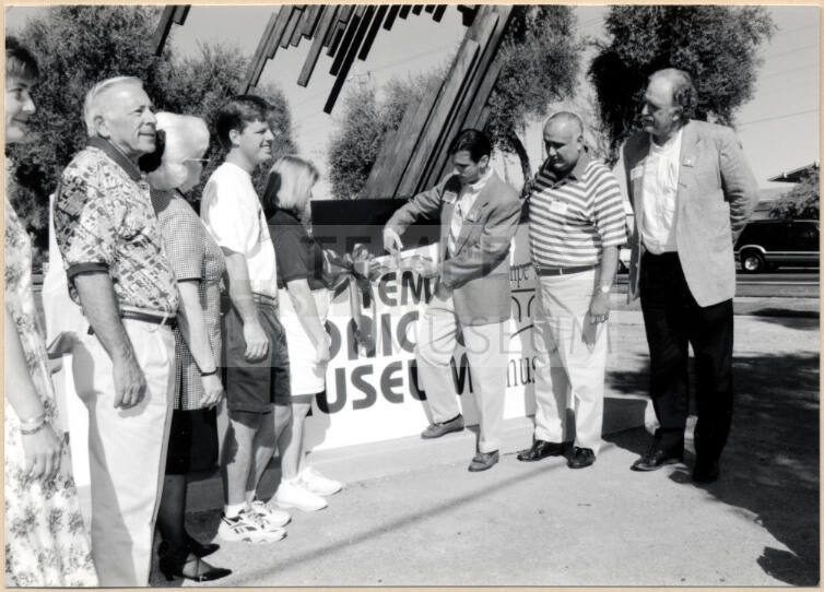 Mayor Neil Giuliano and City Council Cutting the Ribbon of a Sign at the Tempe Historical Museum, 1996.