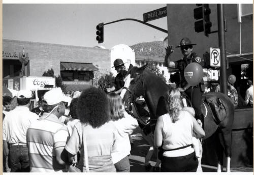 Mounted Police Officers and Crowd at Mill Ave. and 5th St.