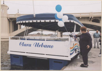 Photo of the christening of the Clara Urbano Boat.