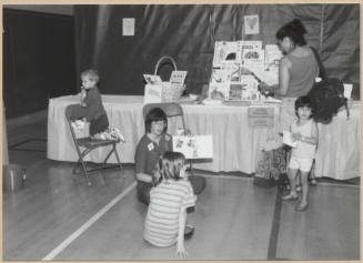 Photo of Stand for Children event book table.