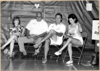 Photo of Councilman Arredondo seated with Stand For Children event participants.