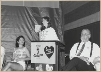Photo of a speaker at Stand For Children event.