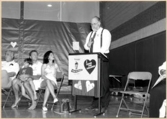 Photo of Councilman Cahill speaking at Stand For Children event.