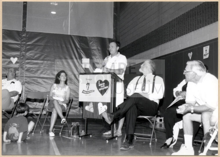 Photo of Stand for Children event with speaker and councilmen.