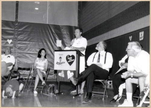 Photo of Stand for Children event with speaker and councilmen.
