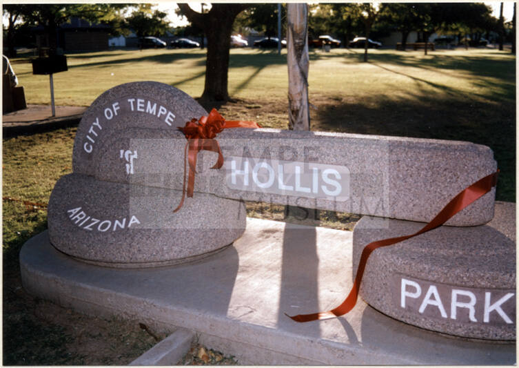 Color photograph of stone Hollis Park sign at park dedication
