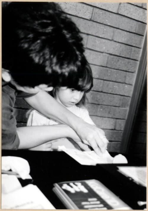 Black and White photograph of finger painting at Fire Prevention Day