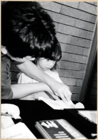 Black and White photograph of finger painting at Fire Prevention Day