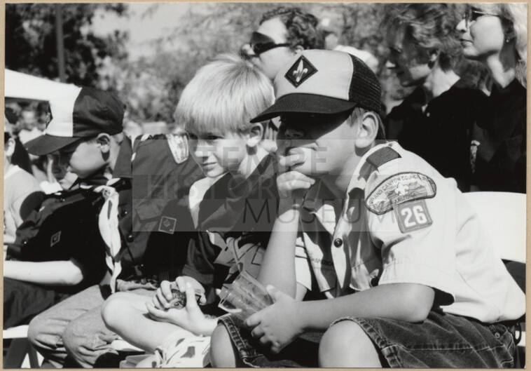 Black and white photograph of Boy Scouts watching Apache Blvd. Fire Station dedication