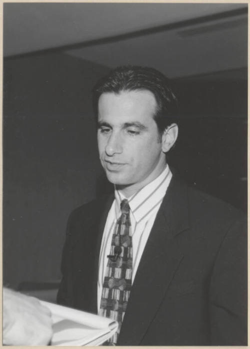 Black and white photograph of Mayor Niel Giuliano at Town Lake contract signing