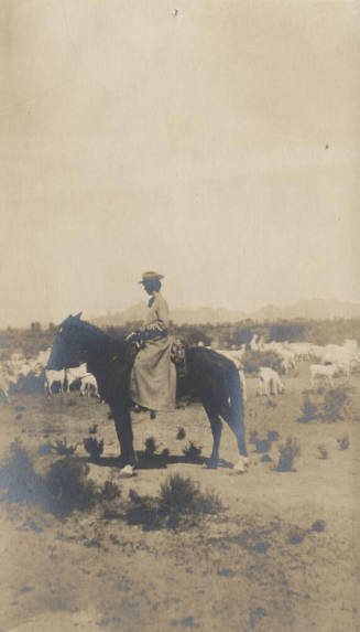 Unidentified Woman on Horseback and Goats