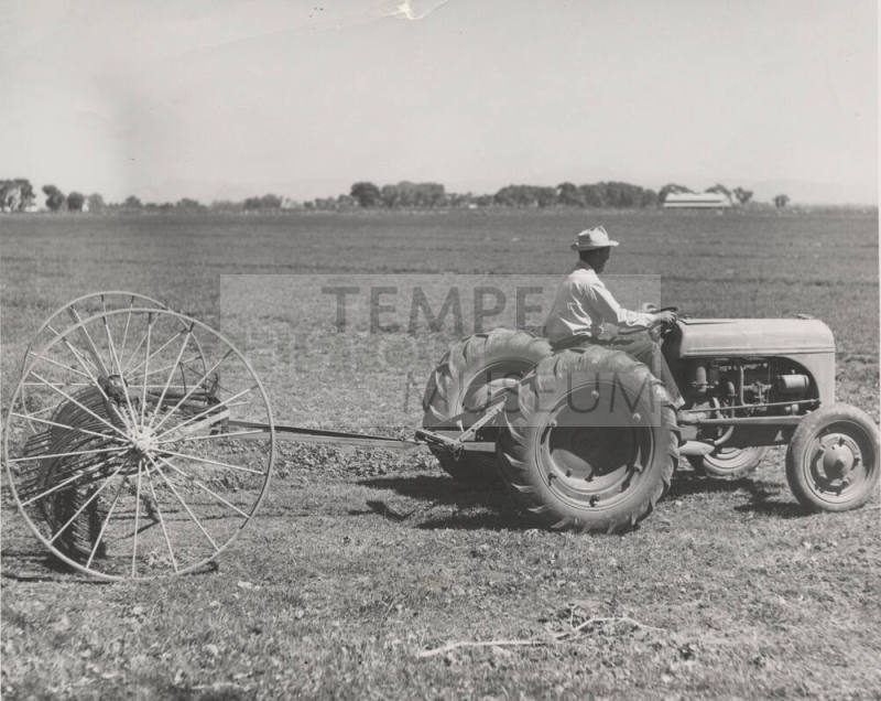 Leo Ramsey on Tractor Pulling Hay Rake