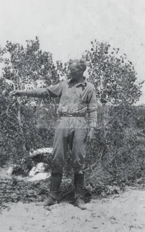 A Man Holding a Snake