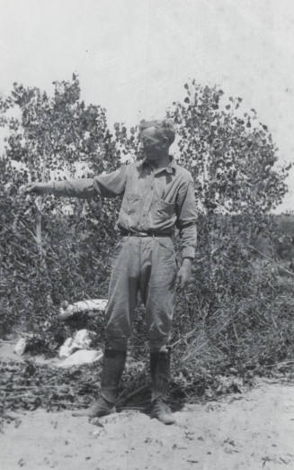 A Man Holding a Snake