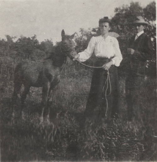 Estelle Craig Holding a New Born Horse