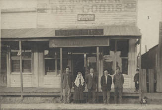 Group Portrait at Grocery Storefront