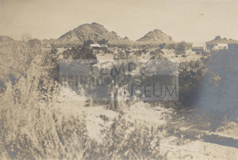 Exterior of Unknown Structure and Papago Buttes