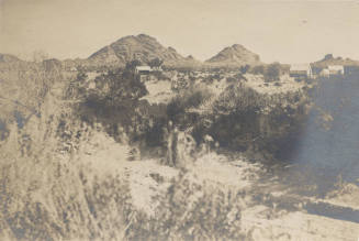 Exterior of Unknown Structure and Papago Buttes