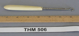 Metal buttonhook with ivory handle
