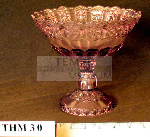 lavender-colored  glass compote